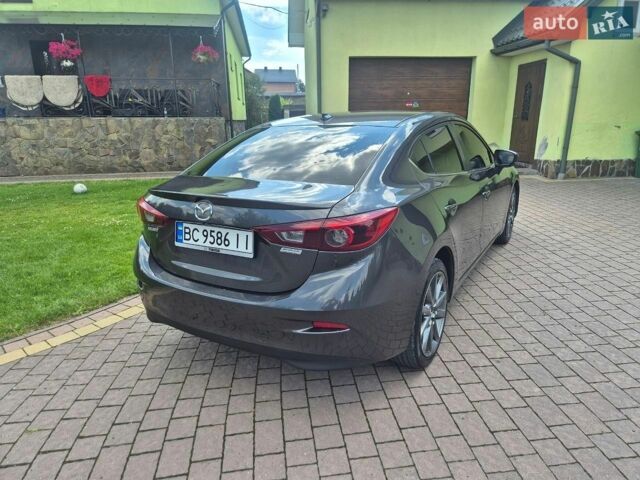 Сірий Мазда 3, об'ємом двигуна 2.49 л та пробігом 76 тис. км за 12000 $, фото 7 на Automoto.ua