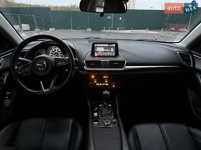 Серый Мазда 3, объемом двигателя 2.49 л и пробегом 74 тыс. км за 15000 $, фото 4 на Automoto.ua