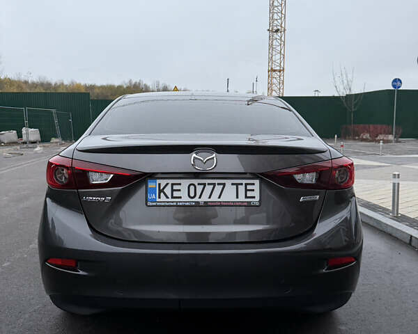 Серый Мазда 3, объемом двигателя 2.49 л и пробегом 74 тыс. км за 15000 $, фото 3 на Automoto.ua