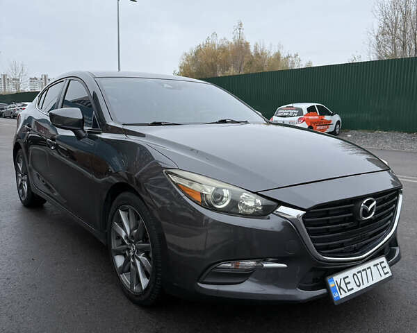 Серый Мазда 3, объемом двигателя 2.49 л и пробегом 74 тыс. км за 15000 $, фото 2 на Automoto.ua