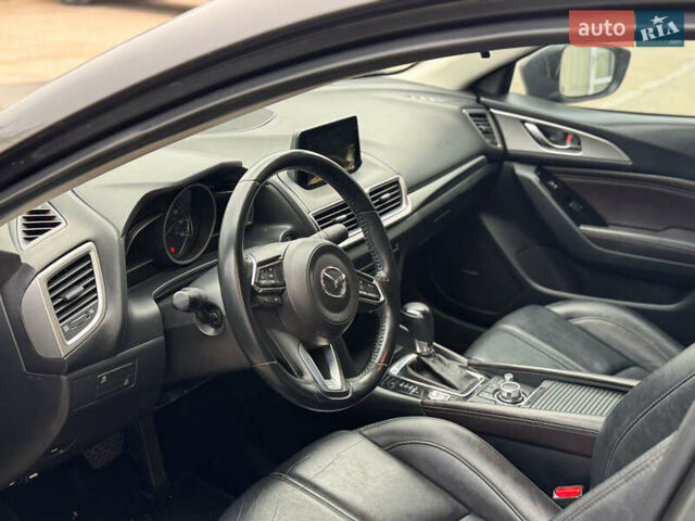 Серый Мазда 3, объемом двигателя 2 л и пробегом 202 тыс. км за 11000 $, фото 4 на Automoto.ua
