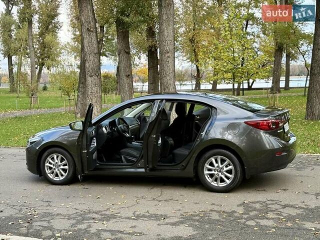 Серый Мазда 3, объемом двигателя 1.5 л и пробегом 52 тыс. км за 15400 $, фото 22 на Automoto.ua