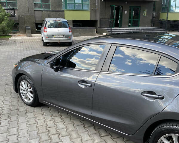 Сірий Мазда 3, об'ємом двигуна 2 л та пробігом 149 тис. км за 10900 $, фото 4 на Automoto.ua