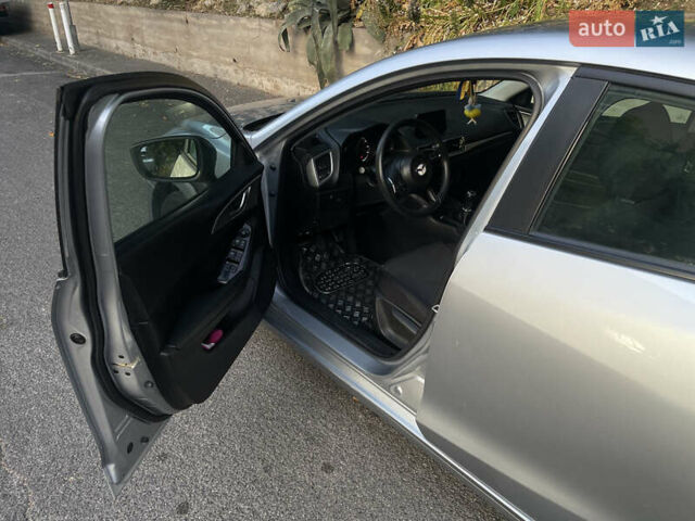 Серый Мазда 3, объемом двигателя 2 л и пробегом 90 тыс. км за 9444 $, фото 4 на Automoto.ua