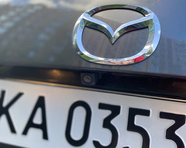 Сірий Мазда 3, об'ємом двигуна 2 л та пробігом 149 тис. км за 10900 $, фото 13 на Automoto.ua