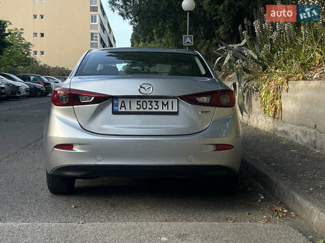 Серый Мазда 3, объемом двигателя 2 л и пробегом 90 тыс. км за 9444 $, фото 2 на Automoto.ua