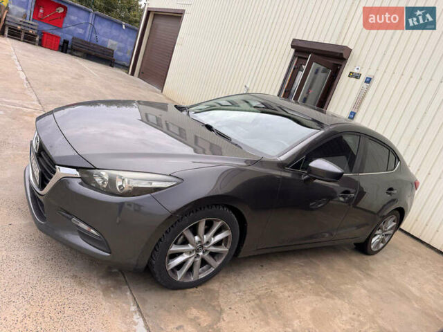 Серый Мазда 3, объемом двигателя 2 л и пробегом 202 тыс. км за 11000 $, фото 2 на Automoto.ua
