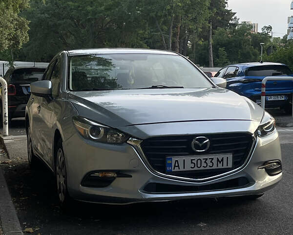 Серый Мазда 3, объемом двигателя 2 л и пробегом 90 тыс. км за 9444 $, фото 1 на Automoto.ua