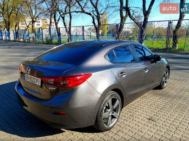 Серый Мазда 3, объемом двигателя 2 л и пробегом 69 тыс. км за 13500 $, фото 3 на Automoto.ua