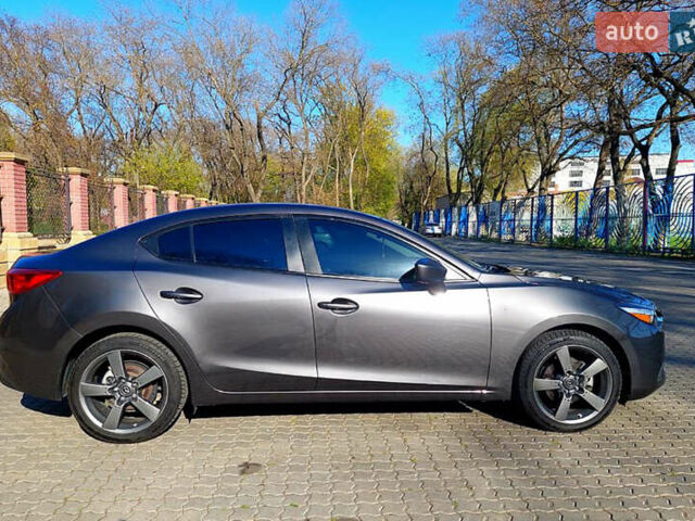 Серый Мазда 3, объемом двигателя 2 л и пробегом 69 тыс. км за 13500 $, фото 4 на Automoto.ua