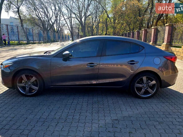 Серый Мазда 3, объемом двигателя 2 л и пробегом 69 тыс. км за 13500 $, фото 5 на Automoto.ua