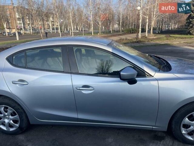 Серый Мазда 3, объемом двигателя 2 л и пробегом 170 тыс. км за 12300 $, фото 3 на Automoto.ua