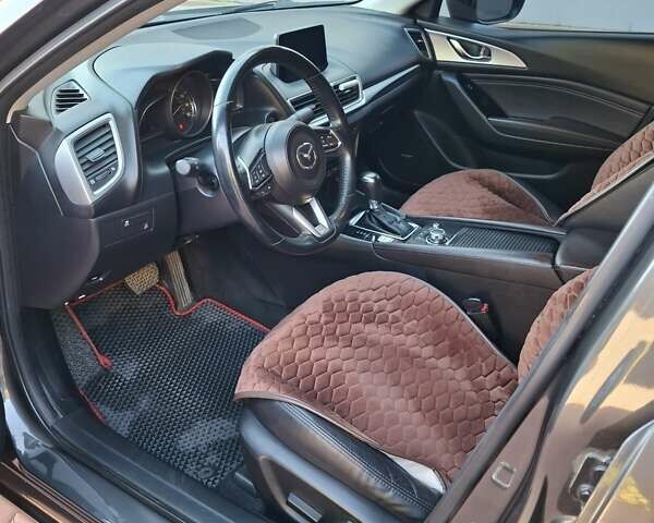 Серый Мазда 3, объемом двигателя 2.49 л и пробегом 60 тыс. км за 15000 $, фото 6 на Automoto.ua