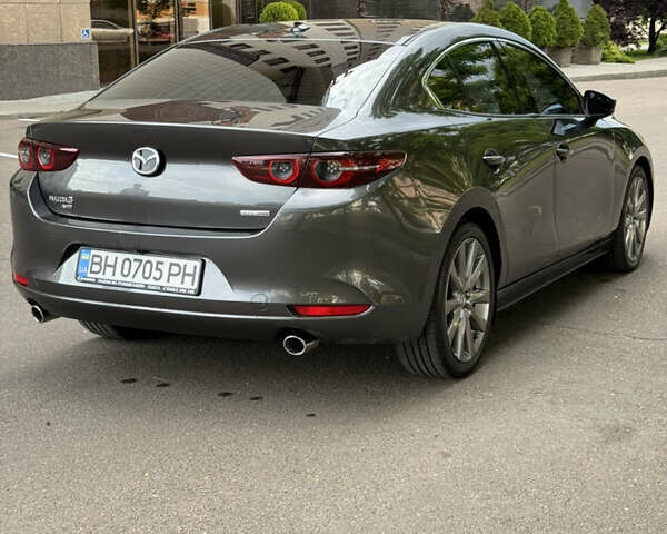 Сірий Мазда 3, об'ємом двигуна 2.49 л та пробігом 44 тис. км за 19000 $, фото 4 на Automoto.ua