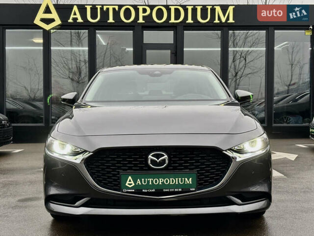 Серый Мазда 3, объемом двигателя 1.76 л и пробегом 62 тыс. км за 18900 $, фото 2 на Automoto.ua