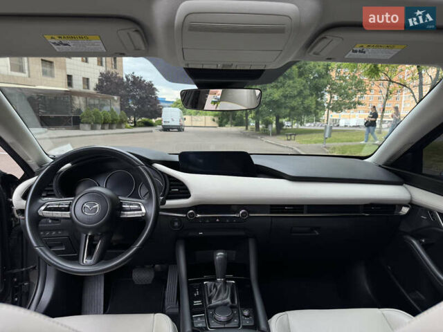 Сірий Мазда 3, об'ємом двигуна 2.49 л та пробігом 44 тис. км за 19000 $, фото 6 на Automoto.ua