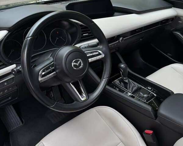 Сірий Мазда 3, об'ємом двигуна 2.49 л та пробігом 44 тис. км за 19000 $, фото 10 на Automoto.ua