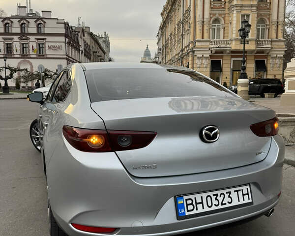 Серый Мазда 3, объемом двигателя 2.49 л и пробегом 48 тыс. км за 15500 $, фото 4 на Automoto.ua