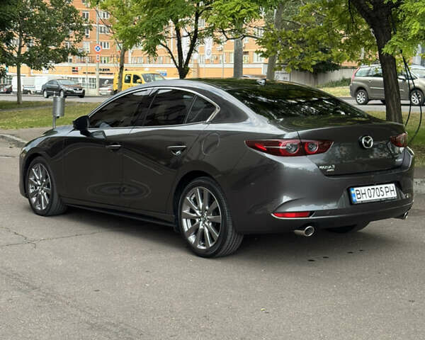 Сірий Мазда 3, об'ємом двигуна 2.49 л та пробігом 44 тис. км за 19000 $, фото 3 на Automoto.ua
