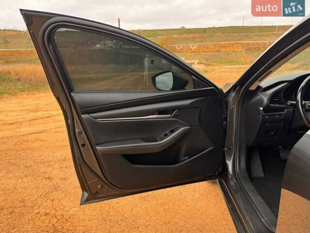 Серый Мазда 3, объемом двигателя 2.49 л и пробегом 74 тыс. км за 15900 $, фото 24 на Automoto.ua