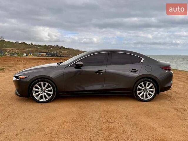 Серый Мазда 3, объемом двигателя 2.49 л и пробегом 74 тыс. км за 15900 $, фото 1 на Automoto.ua