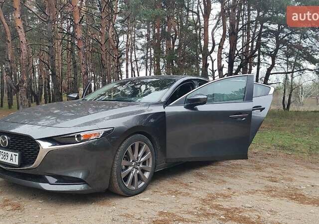 Серый Мазда 3, объемом двигателя 2.49 л и пробегом 109 тыс. км за 15350 $, фото 12 на Automoto.ua