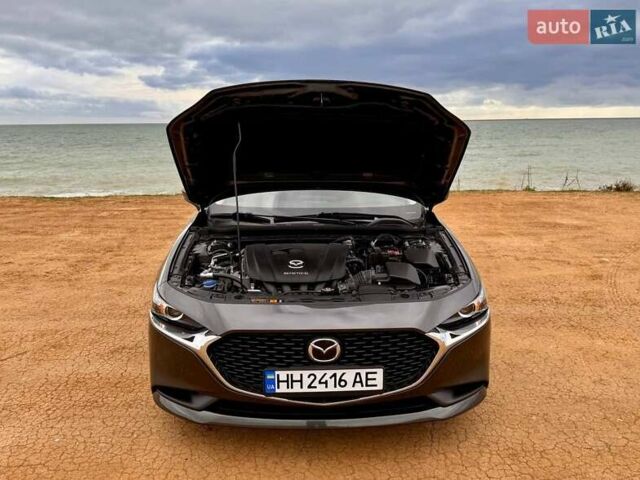 Серый Мазда 3, объемом двигателя 2.49 л и пробегом 74 тыс. км за 15900 $, фото 32 на Automoto.ua