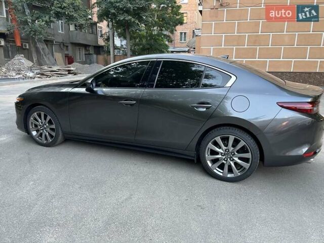 Серый Мазда 3, объемом двигателя 2.49 л и пробегом 143 тыс. км за 16100 $, фото 4 на Automoto.ua