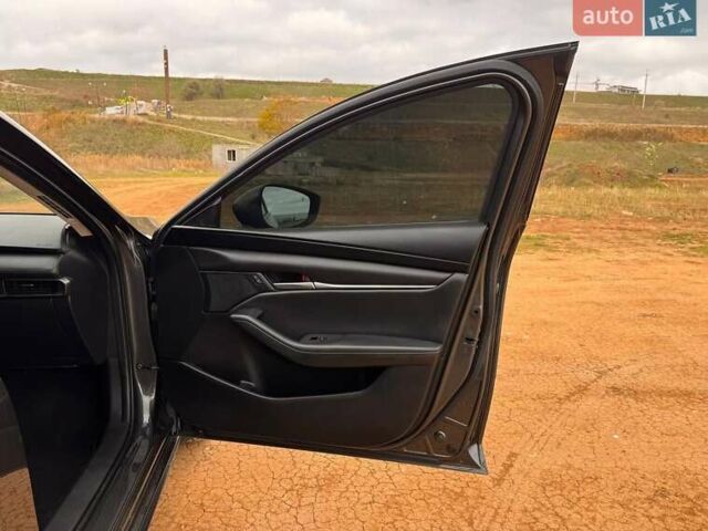 Серый Мазда 3, объемом двигателя 2.49 л и пробегом 74 тыс. км за 15900 $, фото 17 на Automoto.ua