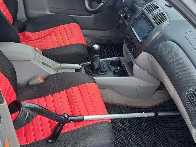 Серый Мазда 3, объемом двигателя 1.6 л и пробегом 245 тыс. км за 1450 $, фото 7 на Automoto.ua