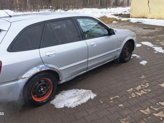 Серый Мазда 3, объемом двигателя 1.6 л и пробегом 245 тыс. км за 1450 $, фото 2 на Automoto.ua