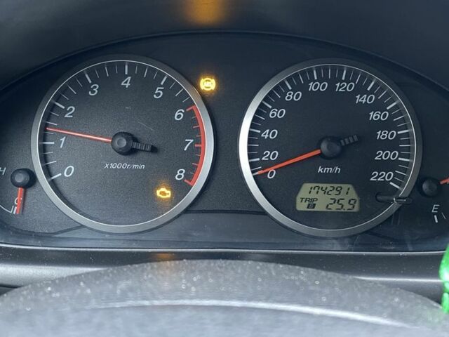 Серый Мазда 3, объемом двигателя 1.2 л и пробегом 174 тыс. км за 5000 $, фото 10 на Automoto.ua