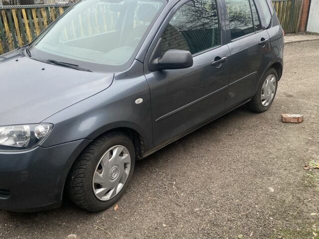 Серый Мазда 3, объемом двигателя 1.2 л и пробегом 174 тыс. км за 5000 $, фото 1 на Automoto.ua