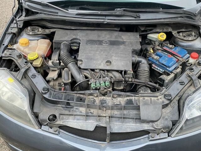 Серый Мазда 3, объемом двигателя 1.2 л и пробегом 174 тыс. км за 5000 $, фото 14 на Automoto.ua