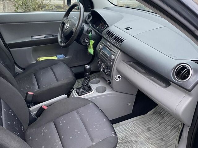 Серый Мазда 3, объемом двигателя 1.2 л и пробегом 174 тыс. км за 5000 $, фото 13 на Automoto.ua