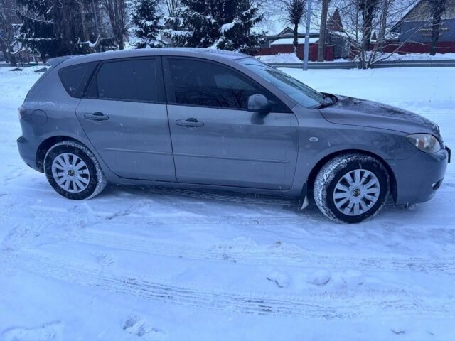 Серый Мазда 3, объемом двигателя 1.6 л и пробегом 258 тыс. км за 4200 $, фото 3 на Automoto.ua