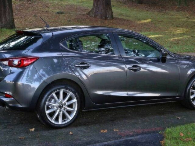 Серый Мазда 3, объемом двигателя 2 л и пробегом 50 тыс. км за 2000 $, фото 7 на Automoto.ua