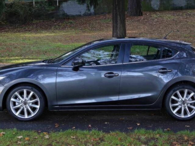 Сірий Мазда 3, об'ємом двигуна 2 л та пробігом 59 тис. км за 7500 $, фото 4 на Automoto.ua