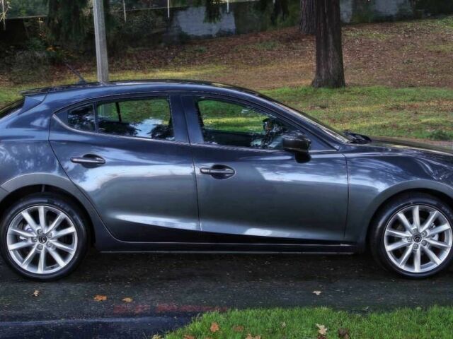 Сірий Мазда 3, об'ємом двигуна 2 л та пробігом 59 тис. км за 7500 $, фото 3 на Automoto.ua