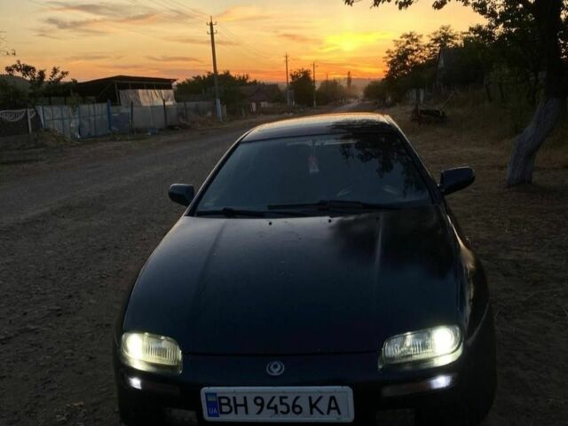 Синий Мазда 3, объемом двигателя 1.5 л и пробегом 250 тыс. км за 1350 $, фото 5 на Automoto.ua