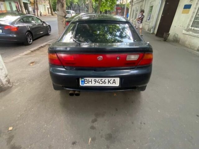 Синий Мазда 3, объемом двигателя 1.5 л и пробегом 250 тыс. км за 1350 $, фото 3 на Automoto.ua