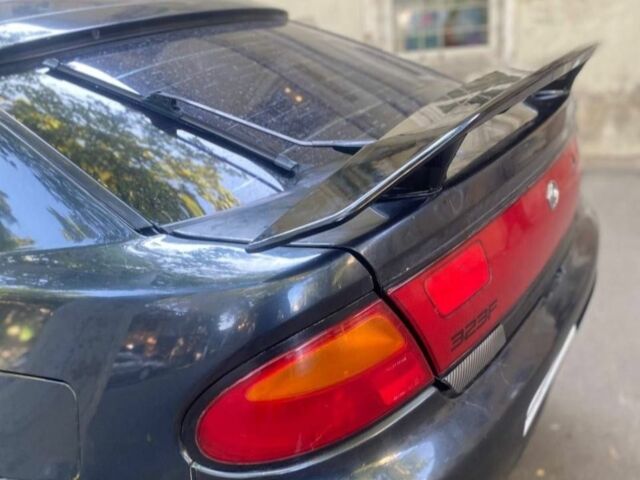 Синий Мазда 3, объемом двигателя 1.5 л и пробегом 250 тыс. км за 1350 $, фото 4 на Automoto.ua