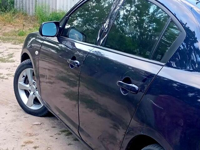Синий Мазда 3, объемом двигателя 1.6 л и пробегом 200 тыс. км за 3300 $, фото 1 на Automoto.ua