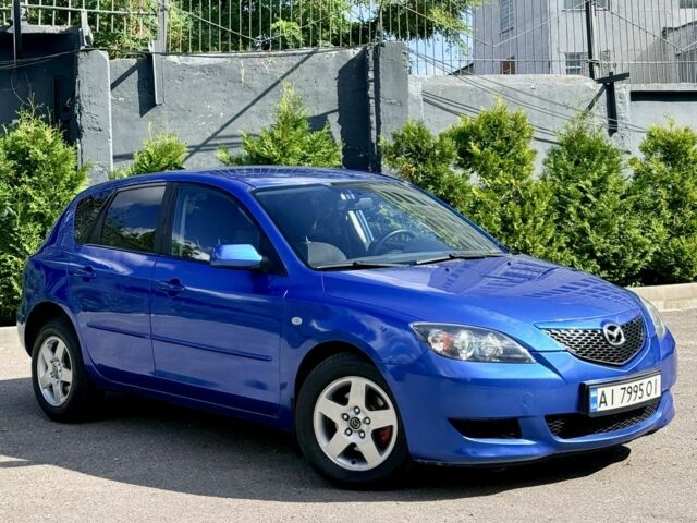 Синий Мазда 3, объемом двигателя 1.6 л и пробегом 250 тыс. км за 4199 $, фото 1 на Automoto.ua