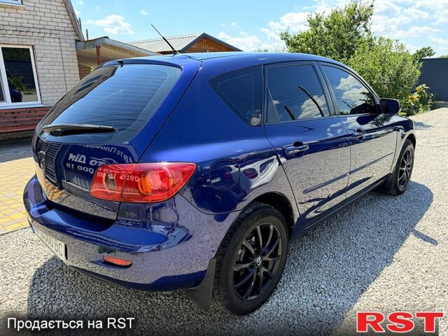 Синий Мазда 3, объемом двигателя 1.6 л и пробегом 202 тыс. км за 3800 $, фото 7 на Automoto.ua