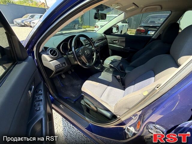 Синий Мазда 3, объемом двигателя 1.6 л и пробегом 202 тыс. км за 3800 $, фото 10 на Automoto.ua