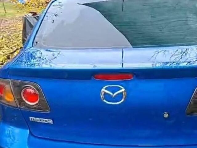 Синий Мазда 3, объемом двигателя 2 л и пробегом 215 тыс. км за 5000 $, фото 5 на Automoto.ua