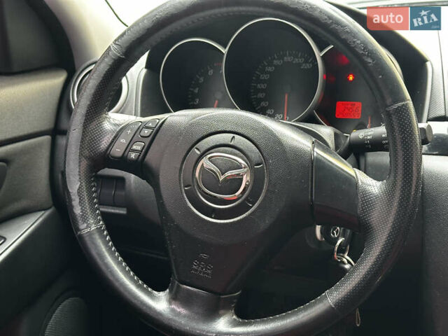 Синій Мазда 3, об'ємом двигуна 1.6 л та пробігом 258 тис. км за 2999 $, фото 10 на Automoto.ua