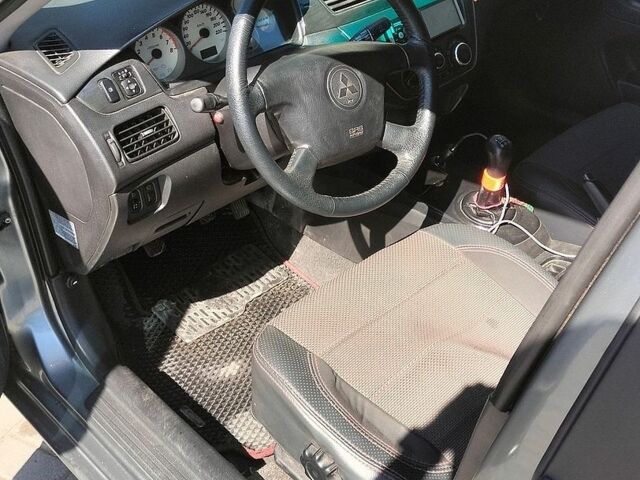 Синий Мазда 3, объемом двигателя 2 л и пробегом 330 тыс. км за 4400 $, фото 14 на Automoto.ua