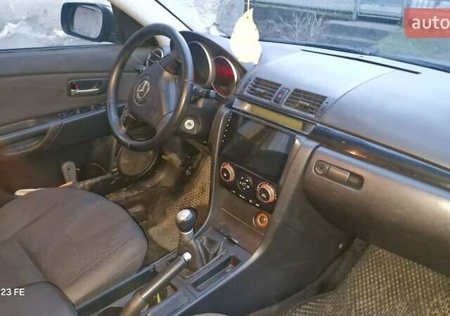 Синій Мазда 3, об'ємом двигуна 1.6 л та пробігом 273 тис. км за 4500 $, фото 5 на Automoto.ua
